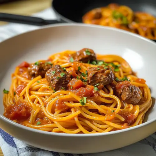 Aromatic tomato pasta with tender beef
